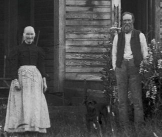 highbinders couple in front of house